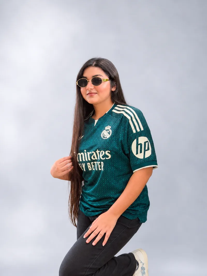 Female model wearing Real Madrid 26/27 away kit — front view